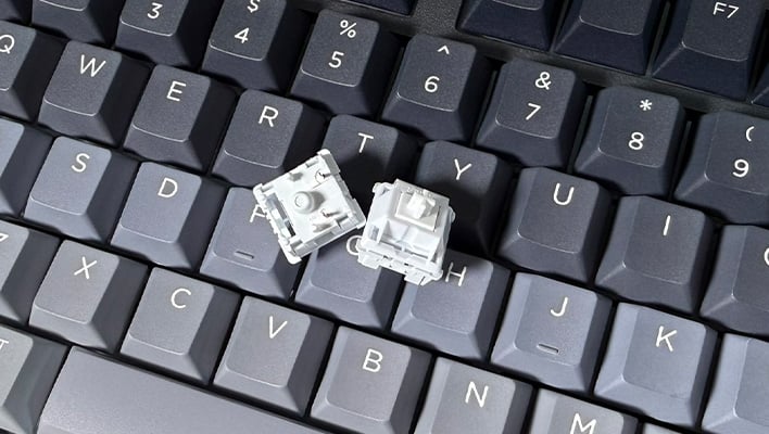 Closeup of Feker Marble White switches on Epomaker's Galaxy100 Lite keyboard.