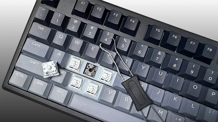 Closeup of keycaps and key switches removed from Epomaker's Galaxy100 Lite keyboard.