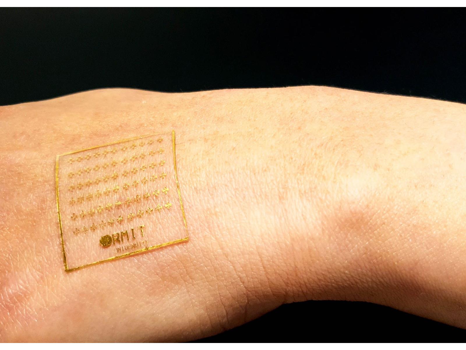 Hairthin electronic skin monitors hearts and brains controls video  games  Discover Magazine