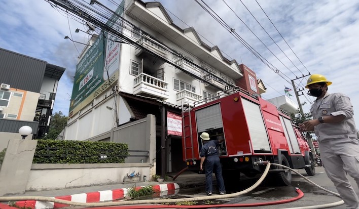 Fire truck outside a fire-damaged building that authorities believe was a cryptocurrency mining farm