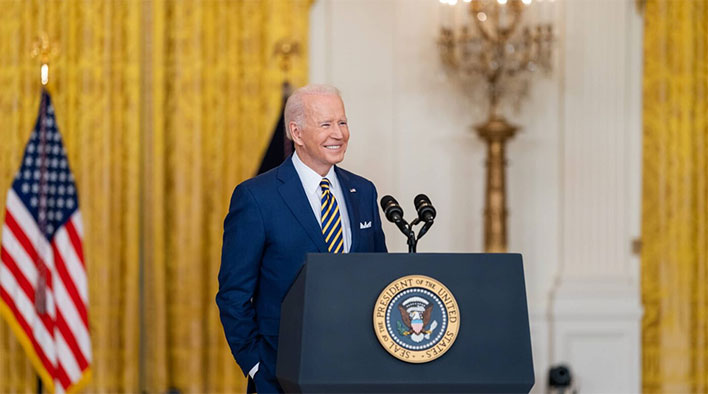 US President Joe Biden behind podium