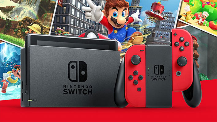 Nintendo Switch in front of Super Mario background
