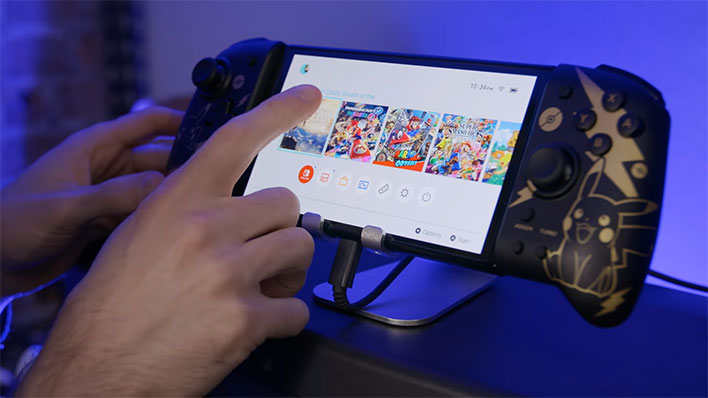Nintendo Switch OLED on a stand