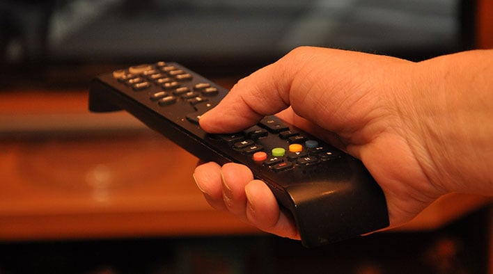 person tv remote
