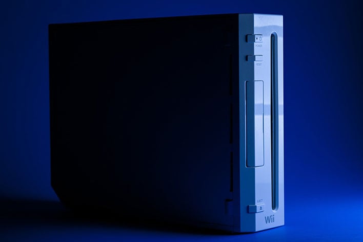 Nintendo Wii console on a blue background