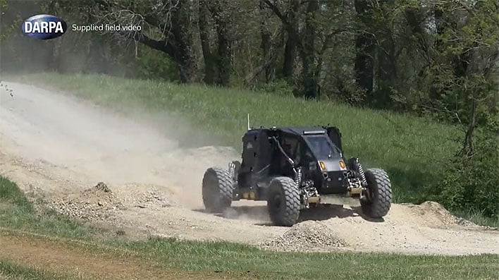 Offroad vehicle traveling on a dirt road