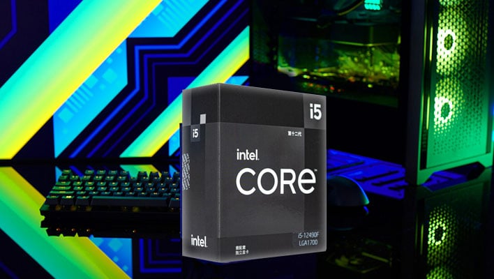 Intel Core i5-12490F retail box next to a desktop PC