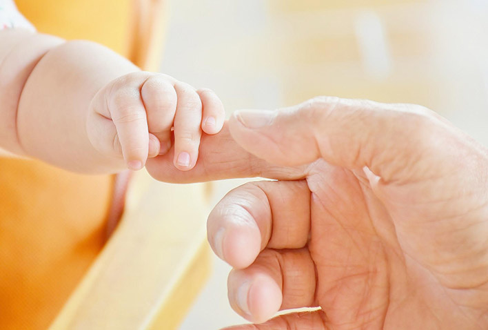 baby adult hands