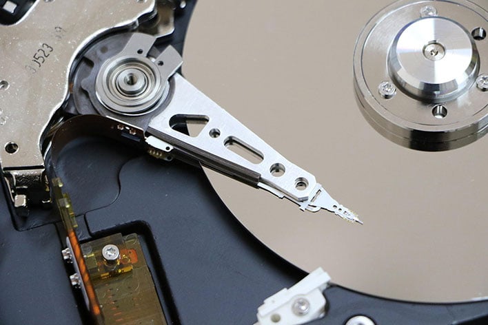 Closeup of a hard drive's platter and actuator
