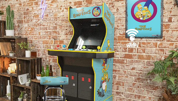 Arcade1Up Simpsons cabinet against a brick wall.