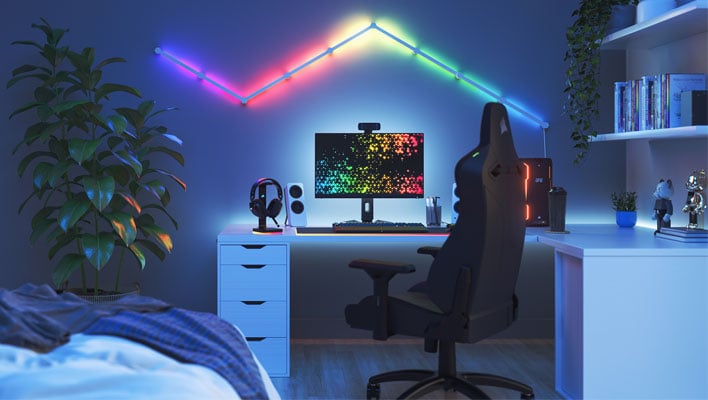 Office bedroom with Nanoleaf smart lighting on the wall controlled via Corsair's iCUE software.