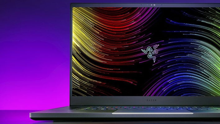 Razer Blade gaming laptop on a purple gradient background.
