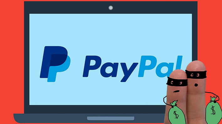 Fingers dressed up as thieves in front of a laptop with the PayPal logo on the screen.