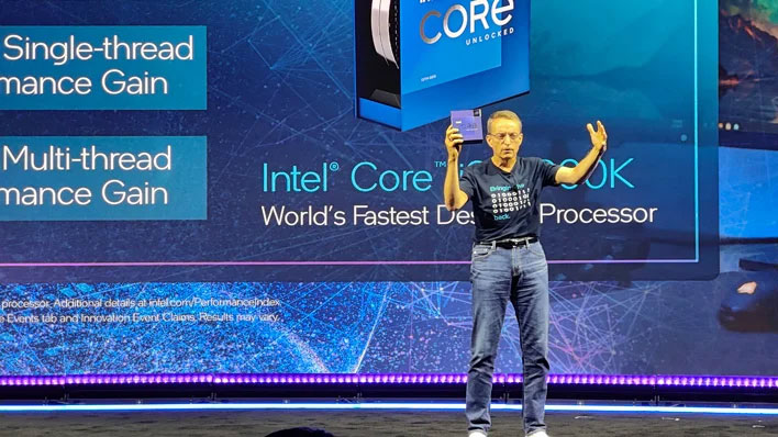 Intel CEO Pat Gelsinger holding a Raptor Lake CPU box.