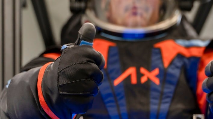 hero person in axiom spacesuit giving thumbs up