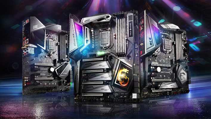 Three MSI motherboards standing vertically.