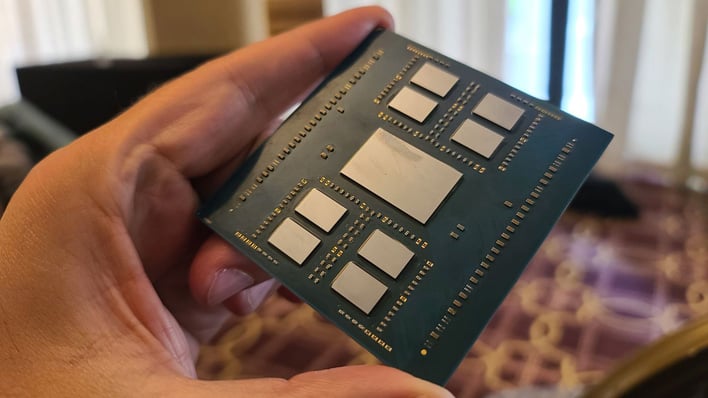HotHardware's Marco Chiappetta holds AMD EPYC Bergamo 128-core processor