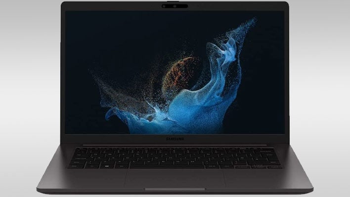 Samsung Galaxy Book2 on a gray gradient background.