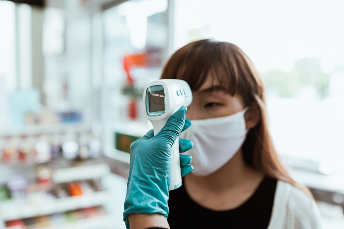 patient having temperature taken