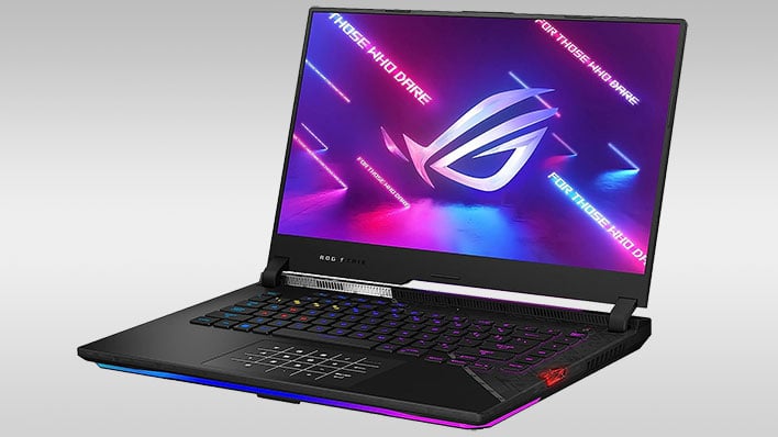 ASUS ROG Strix 15 gaming laptop on a gray gradient background.
