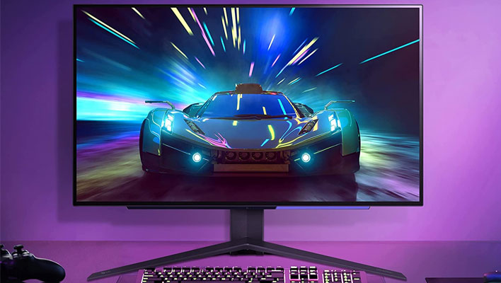 LG UltraGear OLED monitor on a purplish background.