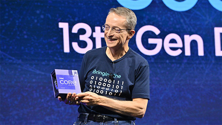 Intel CEO Pat Gelsinger wearing a binary-coded t-shirt and holding a Core i9 box.