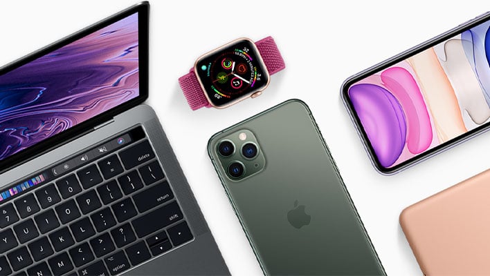 Closeup of a MacBook, Apple Watch, iPhone, and iPad