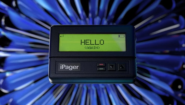 An iPager device with the words "HELLO (AGAIN"" on the display.
