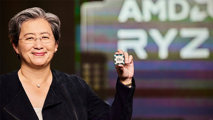 AMD CEO Dr. Lisa Su holding a Ryzen processor.