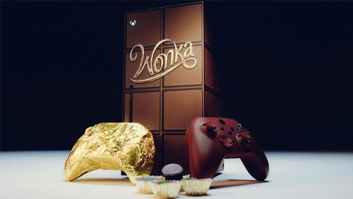 Wonka-themed Xbox Series X with a gold-wrapped chocoate controller, plastic controller, and candy wrappers in front of it.