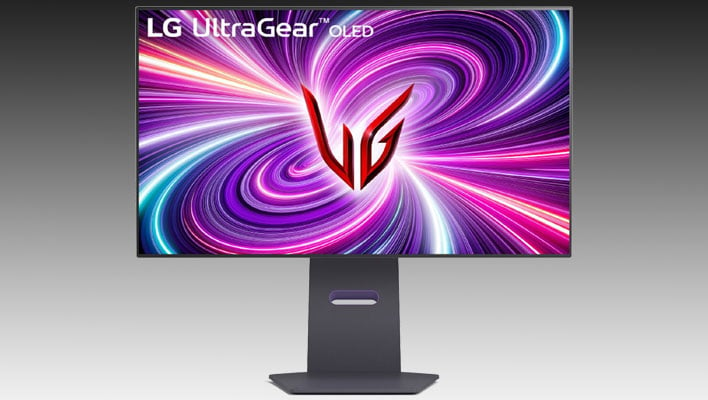 LG UltraGear OLED monitor on a black and gray gradient background.