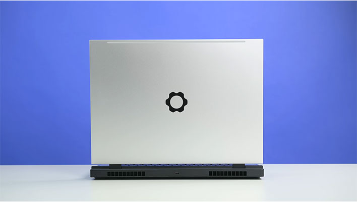 Framework 16 laptop on a blue background.
