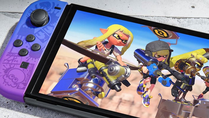 Closeup of a Nintendo Switch console with Splatoon 3 on the display.