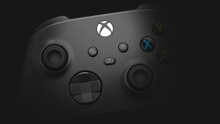 Faded closesup of an Xbox Series X controller on a black background.