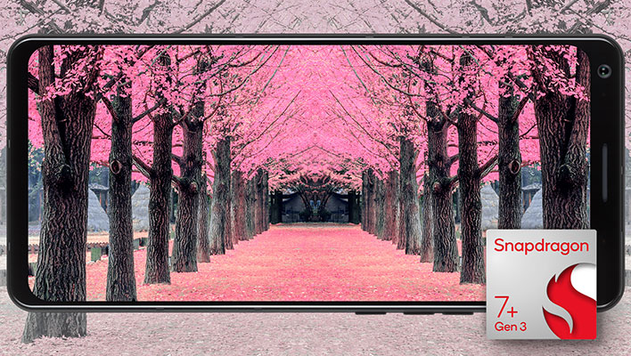 A phone in front of trees with a render of Qualcomm's Snapdragon 7+ Gen 3 in the lower right corner of the image.