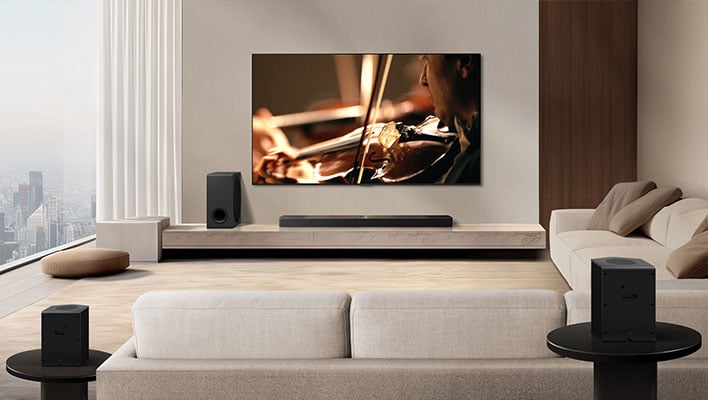 LG S95TR soundbard installed in a living room.