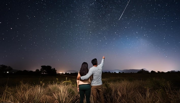 hero couple viewing shooting star