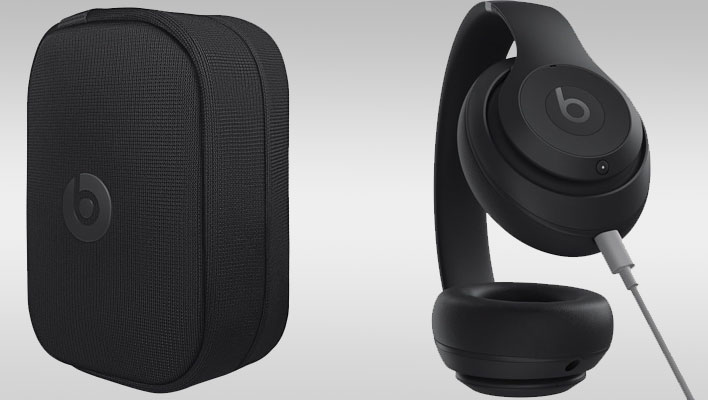 Beats Studio Pro and carrying case on a gray gradient background.