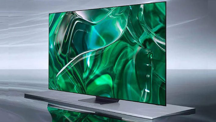 Angled view of Samsung's S95C OLED TV on a platform sitting on a gray watery surface.