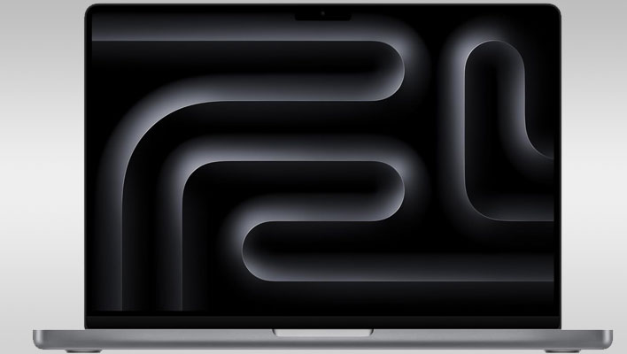 Apple MacBook Pro on a gray gradient background.