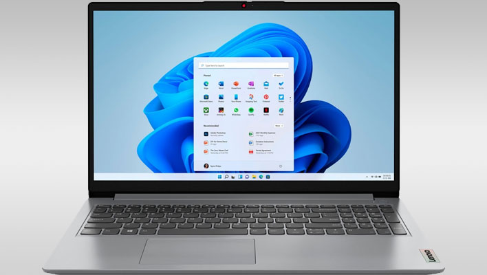 Lenovo IdeaPad 1i on a gray gradient background.
