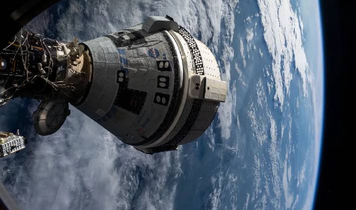 hero boeing starliner docked with iss