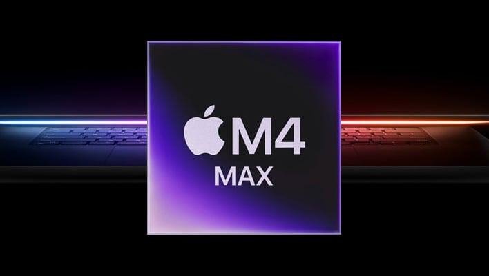 Apple M4 Max in front of a semi-open and glowing MacBook Pro on a black background.