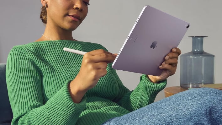 apple ipad air being used