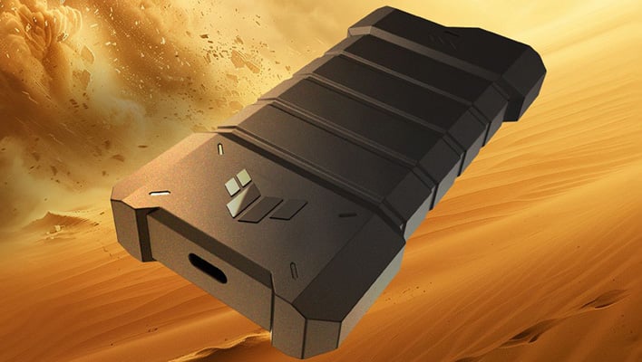 ASUS TUF Gaming A2 SSD enclosure hovering above a desert during a sand storm.