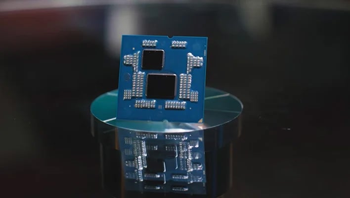 Delidded AMD Ryzen 7 9800X3D processor ona a pedestal.