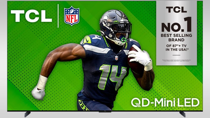 TCL QM7 QLED TV on a gray gradient background.