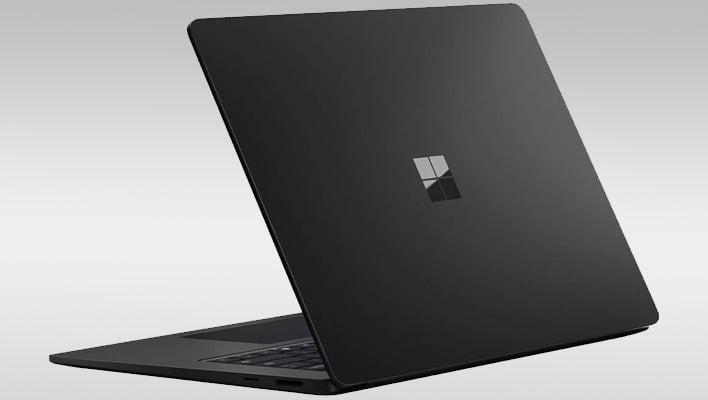 Rear angled view of a Microsoft Surface Laptop on a gray gradient background.