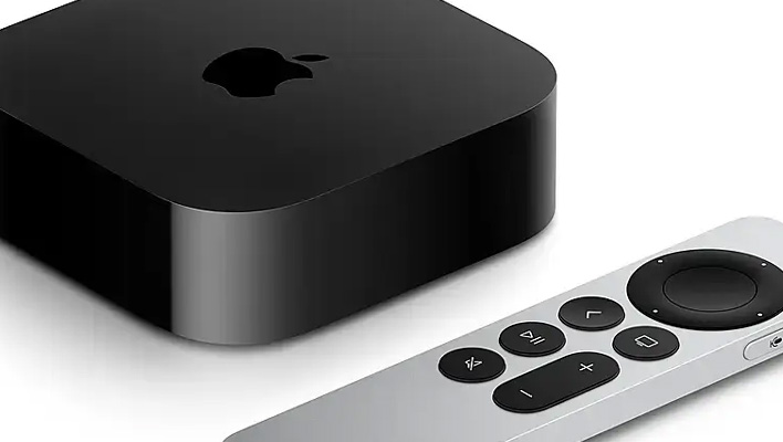 Apple TV box and remote.