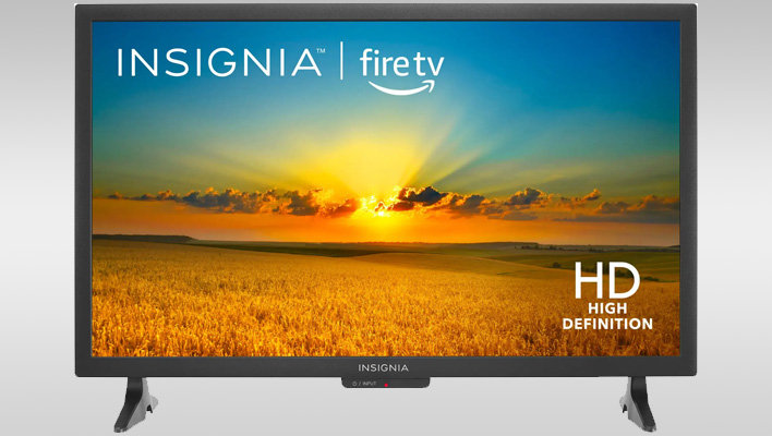Insignia Fire TV on a gray gradient background.